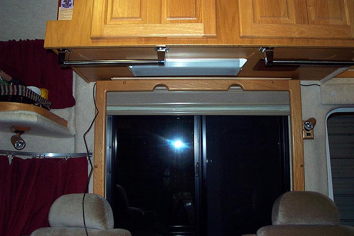 Photo #8 - This photo shows the USB Extension Cable routed above the window frame on the right side of the coach providing enough length to connect to a laptop.