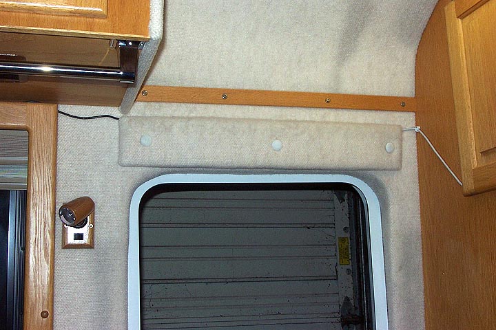 Photo #7 - This photo shows the CapiFi USB Cable and the 10' USB Extension Cable routed above the coach access door.  The junction of these two cables is hidden behind the upholstery panel above the door.