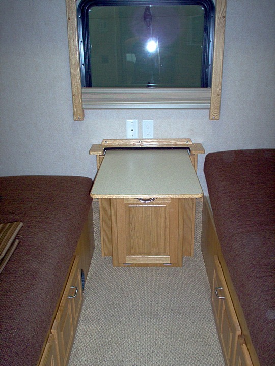 Bedroom pullup table in lieu of nightstand