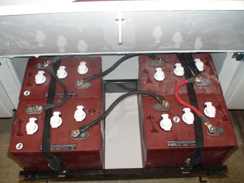 battery tray showing all 4 batteries out.JPG