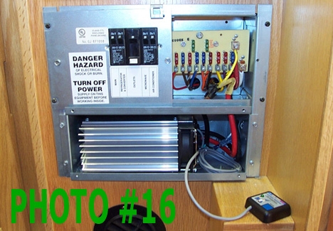 This photo shows the Magnetek/Parallax system with the original 45-amp charger/converter lower section removed and replaced with a Progressive Dynamics PD9160A unit and Charge Wizard Remote Control