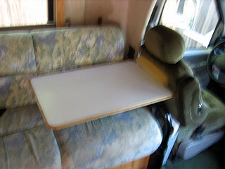 Table locked in position for driving.  Note piece of foam stuffed in to prevent rattle