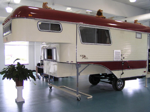 Early Born Free. Is it a slide-in camper or a 5th wheel?